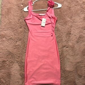 Elegant Pink Dress with Floral Accent